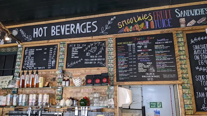 Chalkboard menu of hot beverages, smoothies and fruit juice