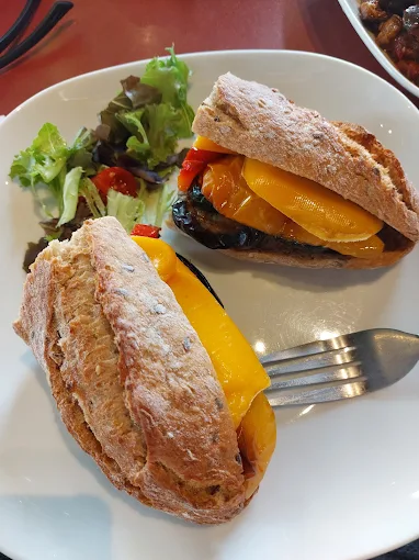 Roasted vegetable and cheese baguette with side salad