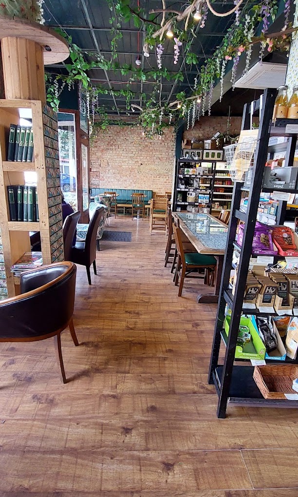 Plant-filled interior of Miss Green Fingers cafe